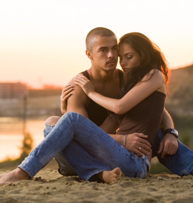 nice guy being nice to girl on a beach