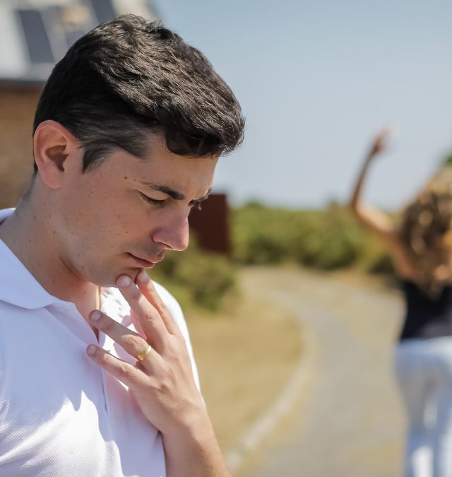 Unhappy man and angry woman leaving after quarrel guy dealing with a moody girlfriend