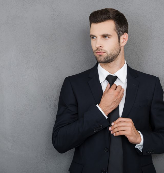 Elegant and successful. a guy with confidence in a suit